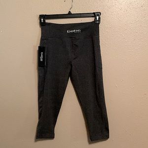 Bebe Sport Gray Women M, workout capris. Pocket on both sides. NWT